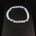 Elegantes Opalith Armband mit verzierten Silberelementen